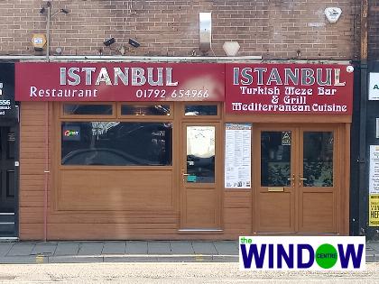 Oak uPVC double doors, windows and cladding.